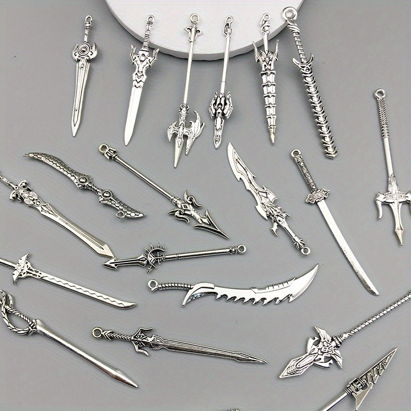 ランダム10/20個入り レトロミニ武器ペンダント シルバー - Vintage Fashion Online のレビューと価格